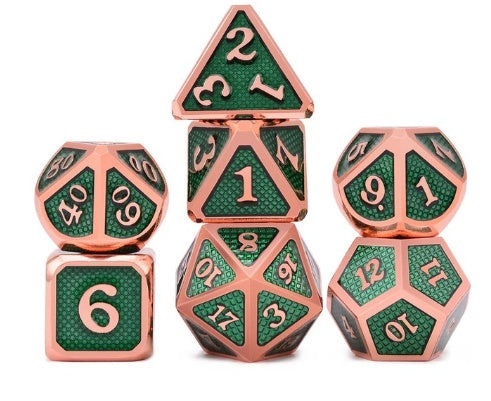 Set of green and rose gold polyhedral dice on a white background