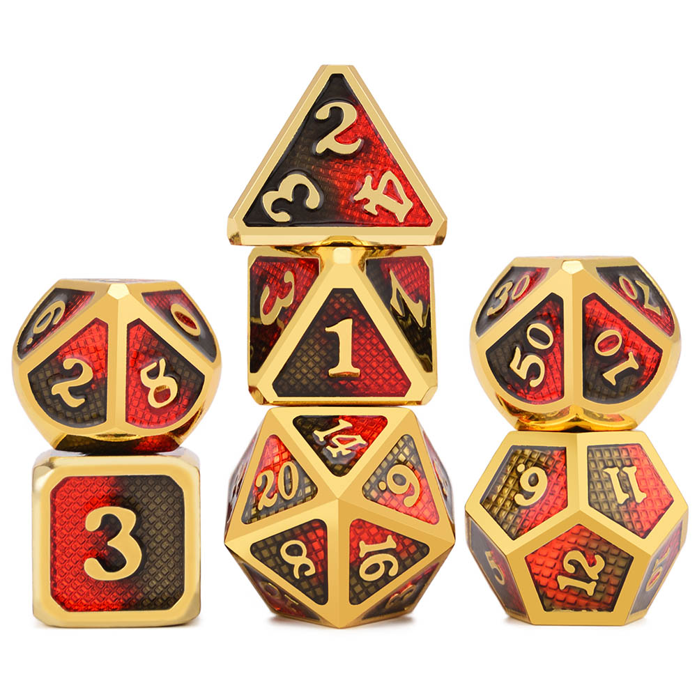 Set of gold and red polyhedral dice on a white background