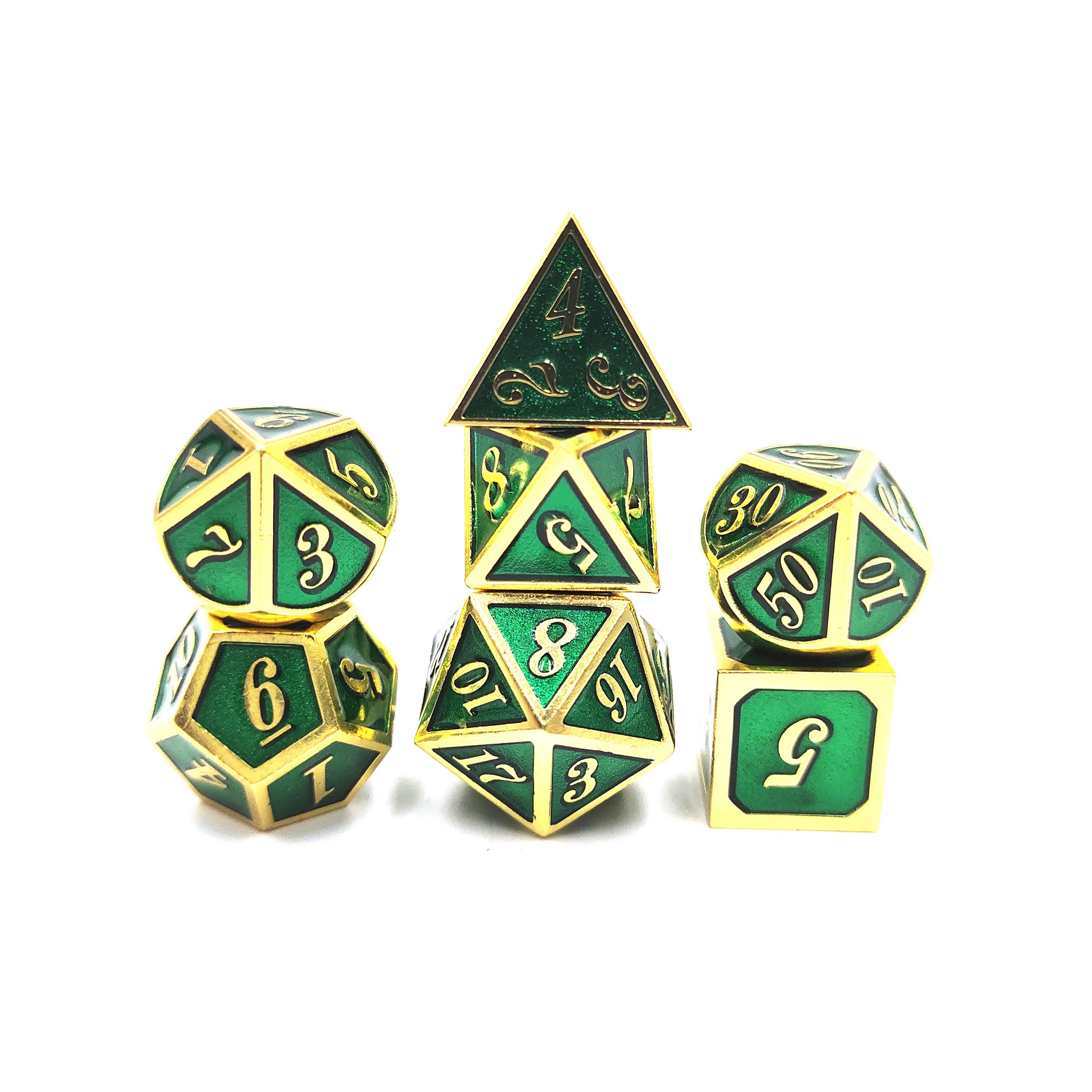 Set of green and gold polyhedral dice on a white background