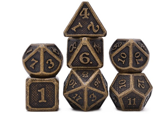 Set of bronze polyhedral dice on a white background